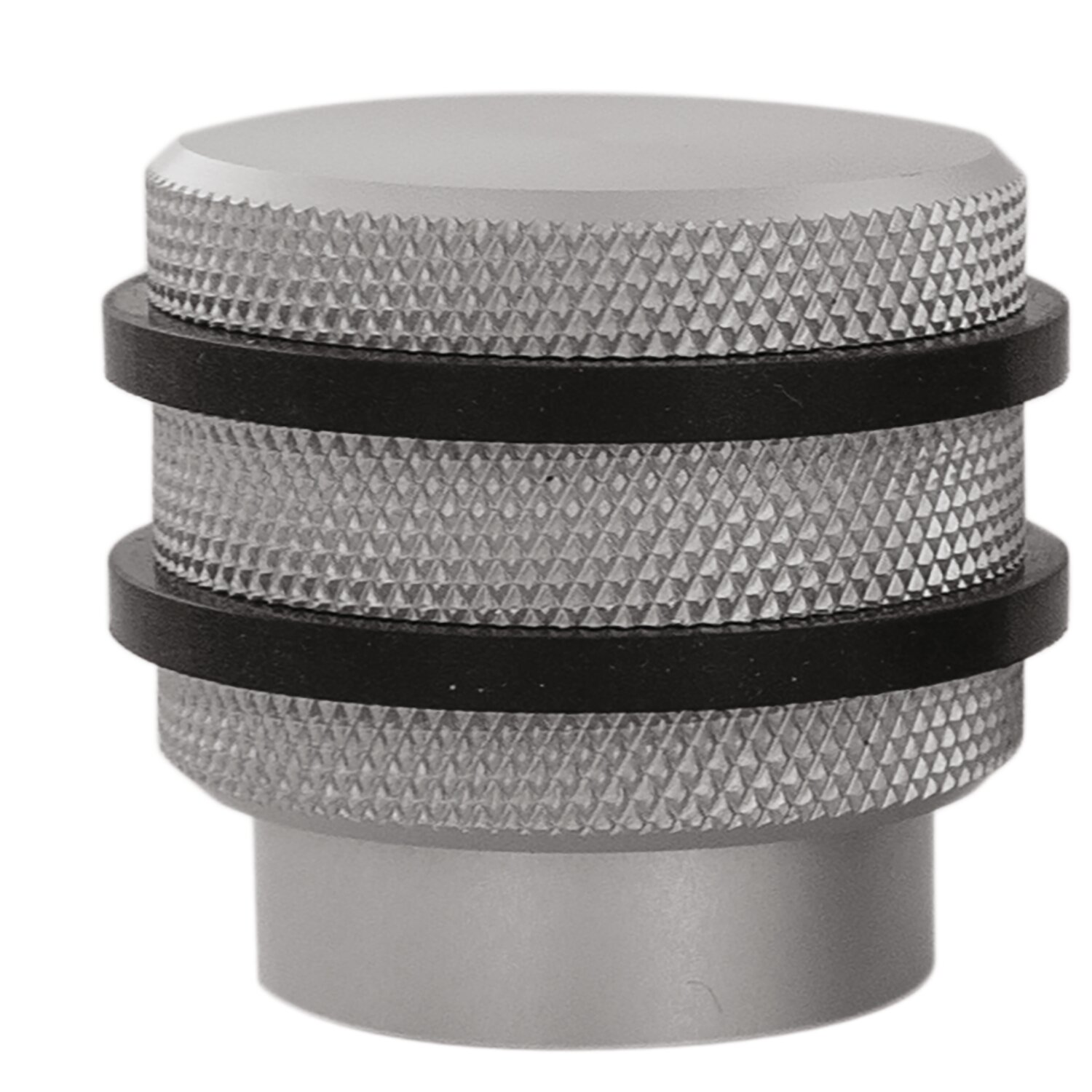 Tapón de diseño moleteado
